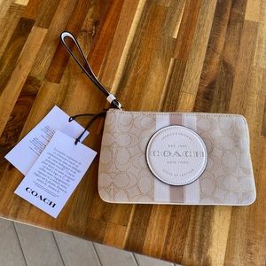 White/Tan Coach Wristlet